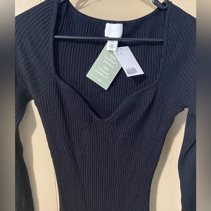 New. Never worn. Midi ribbed black dress w/ sweetheart neckline